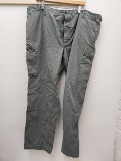 Military Style OD Green Pants/Trousers Button Fly Size-Extra Extra Large Regular Wasit-43 to 47 inches Inseam-29.5 to 32.5 inches Condition-USED in GOOD shape-see pics Has a small hole on the back of the left leg 100% Cotton NOT MILITARY ISSUED Made in the USA!! check us out at www.armysurpluswarehouselexington.com Casual Full Length Buttoned Pants, Casual Full Length Pants With Buttons, Utility Full Length Pants With Button Closure, Casual Straight Leg Cargo Pants With Buttons, Utility Straight Leg Pants With Buttons, Green Pants, Military Fashion, Parachute Pants, Trousers