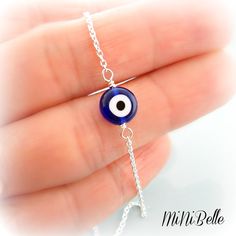 as seen on many this evil eye bracelet I've heard is supposed to bring good luck.... details: Sterling Silver .925 glass evil eye measures 8mm Dainty Chain measures 1mm please select your desired length from top right drop down menu thanks for looking :0) Adjustable Sterling Silver Evil Eye Bracelet, Adjustable Sterling Silver Evil Eye Jewelry, Adjustable Sterling Silver Evil Eye Bracelet, Spiritual Style, Handmade Sterling Silver Evil Eye Bracelet, Sterling Silver Evil Eye Bracelet As Gift, Sterling Silver Evil Eye Bracelet For Gift, Sterling Silver Spiritual Evil Eye Bracelet Gift, Spiritual Adjustable Sterling Silver Evil Eye Bracelet, Spiritual Sterling Silver Evil Eye Bracelet Gift