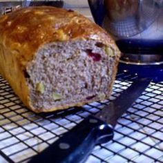 a loaf of bread sitting on top of a cooling rack