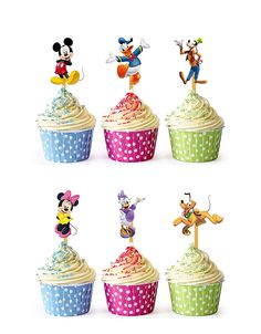 cupcakes with mickey mouse figurines on top are arranged in different colors