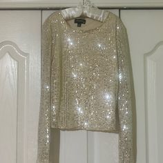 Big Girl Size M. Cream Colored With Silver Sequins Glamorous Shiny Tops For Spring, Shiny Tops For Party Season, Metallic Shiny Top For Party Season, Sparkling Tops For Party Season, Sparkling Tops For Festive Party Season, Glamorous Shimmer Top For Holidays, Festive Sparkling Tops For Party Season, Shiny Tops For Night Out And Holiday, Glamorous Shiny Gold Tops