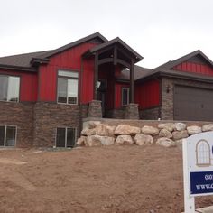 a house with a sign in front of it that says welcome to the homeowners