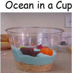 an ocean in a cup is sitting on the counter