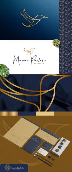 an assortment of business cards and envelopes with gold foil on the front, in blue background