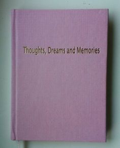 a pink book with the words thoughts, dreams and memories written on it