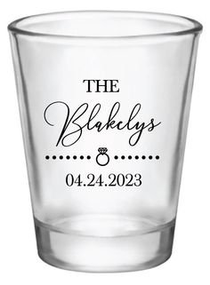 a shot glass with the name and date on it