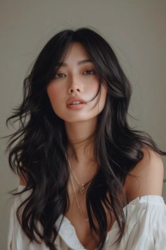 Woman with long dark hair and subtle makeup looking at the camera with a gentle expression, wearing a white off-shoulder top and a delicate necklace. Curtain Bangs Prom Hair, Asian Medium Length Hair With Layers, Layered Hair With Curtain Bangs, Versatile Haircut, Trend Hairstyle, Bangs Styles, Asian Long Hair, Free Hairstyle, Hairstyles Quick