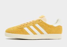 Freshen up your 'fits with these men's Gazelle trainers from adidas Originals. Inspired by heritage style and honouring their beloved 1991 version, they land in a Preloved Yellow colourway. They feature a premium suede upper that offers a soft feel with each step, and have a nylon tongue and lace fastening to lock things in. Sitting on a grippy gum rubber sole, they're signed off with Trefoil logos, serrated 3-Stripes and Gold-foil Gazelle branding. | IF9654 Yellow Adidas, Adidas Originals Gazelle, Sign Off, Heritage Fashion, Adidas Gazelle, Jd Sports, Black Adidas, Gold Foil, Adidas Originals