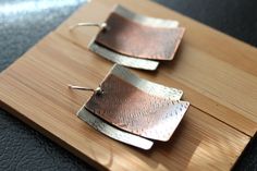 Hey, I found this really awesome Etsy listing at https://www.etsy.com/listing/87049423/mixed-metal-earrings-silver-and-copper Silver Jewelry Cleaner, Copper Jewellery, Mixed Metal Earrings, Mixed Metal Jewelry, Fine Silver Jewelry, Rustic Jewelry, Diy Schmuck, Large Earrings, Modern Earrings