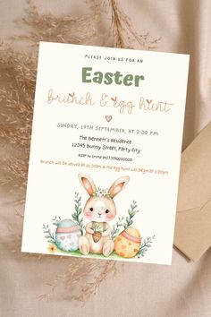 an easter brunch and egg hunt is on display in front of a card