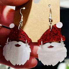 Bring the joy of Christmas to your everyday look with these adorably designed earrings, featuring Santa's red hat and a dangling white beard. The engraved pom pom filled with white oil ink adds a charming touch. Christmas Accessories Zazzle, Red Novelty Christmas Jewelry, Novelty Red Christmas Jewelry, Red Christmas Novelty Jewelry, Red Novelty Jewelry For Christmas, Santa Beard, White Beard, Earring Ideas, Catalog Design