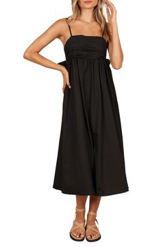 A dramatic bow punctuates this square-neck cotton midi designed in a sleeveless silhouette with a textured bodice. Slips on over head Square neck Adjustable straps Lined 100% cotton Hand wash, dry flat Imported Sleeveless Cotton Midi Dress With Ruched Bodice, Sleeveless Cotton Maxi Dress For Evening, Strapless Sleeveless Dress With Tie Back, Elegant Cotton Maxi Dress With Tie Straps, Chic Cotton Midi Dress With Ruched Bodice, Elegant Cotton Midi Dress With Tie Straps, Chic Solid Cotton Midi Dress, Chic Cotton Dresses With Knotted Straps, Chic Cotton Dress With Knotted Straps