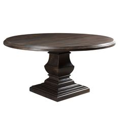 an oval dining table with pedestals and wooden top