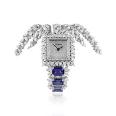 YEPREM Peacock bangle watch is a stunning timepiece adorned with a dazzling array of marquise and round diamonds each boasting remarkable VVS VS and F G color clarity, as well as precious tanzanite stones.The round diamonds are expertly set to enhance the watch’s overall brilliance, while the marquise diamonds add a to Bangle Watches, Tanzanite Stone, Climber Earrings, Ear Cuff Earings, Jewelry Boards, Harry Winston, Long Pendant Necklace, Fabulous Jewelry, Blue Violet