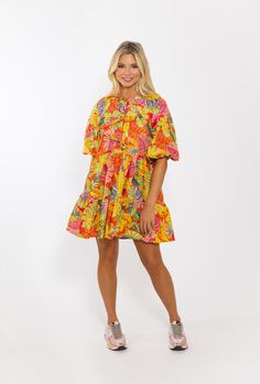 Add a pop of color to your wardrobe with our Tropical Palm Banana Dress. This eye-catching dress features a bold tropical print that will make you stand out in any crowd. The dress is lined for comfort and the puff sleeves add a touch of elegance. Stay stylish and comfortable with this must-have dress. Banana Dress, Tropical Palm, Tropical Print, Puff Sleeves, Puff Sleeve, Must Haves, Color Pop, The Dress, Wardrobe