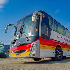 a bus is parked on the side of the road