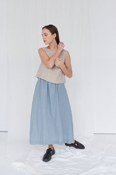 "SIZING & FIT This skirt is loose. Before placing an order, check the approximate measurements of the finished garment given below. Model is 5′6″ (170cm) tall with an 80cm/31″ bust, 68cm/26″ waist, 91cm/35″ hip, and she is wearing an XS in sea green. XS Length ± 95cm | 37.4\" Unstretched waist ± 60cm | 23.6\" Hips ± 130cm | 51.2\" Hem width ± 178cm | 70.1\" S-M Length ± 95cm | 37.4\" Unstretched waist ± 68cm | 26.8\" Hips ± 138cm | 54.3\" Hem width ± 186cm | 73.2\" L-XL Length ± 95cm | 37.4\ Linen Dresses With Relaxed Skirt For Spring, Summer Linen Tiered Maxi Skirt, Summer Tiered Linen Maxi Skirt, Casual Linen Dress With Tiered Skirt, Spring Linen Tiered Maxi Skirt, Spring Tiered Linen Maxi Skirt, Summer Linen Relaxed Fit Maxi Skirt, Relaxed Linen Maxi Skirt For Summer, Summer Linen Dress With Lined Skirt