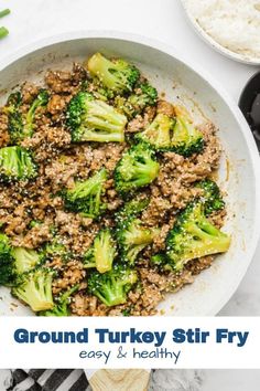 ground turkey stir fry with broccoli in a white bowl on top of a table