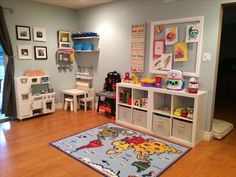 the room is clean and ready to be used as a child's playroom