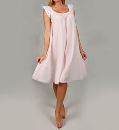 Perfect for those warm-weather nights, this woven, preshrunk cotton gown features pretty, feminine details. Nightgown is Cap sleeves are delicate lace for a pretty touch. Scoop neckline is flattering and graceful. Satin rosette accent at center front. Lace trim at hem adds charm. Relaxed, A-line styling provides a flattering and comfortable fit. Made in the USA. Amanda Rich Women's Short Sleeve with Lace Trim Cotton Gown in Pink (106-80) | Size Medium | HerRoom.com Night Dress Long Elegant, Night Dress Cotton, Nighty Night Dress, Chic Feminine Style, Plus Size Nightgowns, Dresses Long Elegant, Cotton Nighties, Red Lace Bra, Cotton Gowns