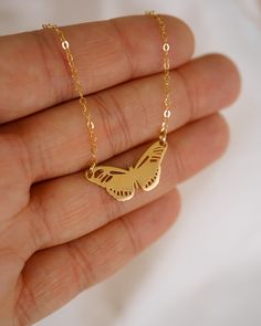 Our Metamorphosis Butterfly Necklace is the perfect accessory to transform any outfit! Crafted with either 18k Gold or Sterling Silver, this customizable necklace features a butterfly design that you can engrave with two initials for a personalized touch! NECKLACE FEATURES Choice of material: Solid High-Quality .925 Sterling Silver. Finish: 18k Gold or Sterling Silver Cable chain is sterling silver or 14K gold filled. Choose to engrave the butterfly with two initials, or leave it blank for a sle Metamorphosis Butterfly, Customizable Necklace, Freshwater Pearls Earrings, Chain Extenders, Pretty Earrings, Butterfly Necklace, Moonstone Ring, The Butterfly, Opal Necklace