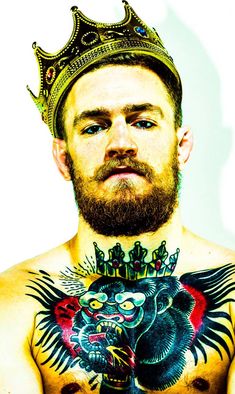 a man with tattoos and a crown on his head