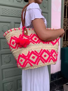 Please Check Our Straw Bags Unique Collection :  https://www.etsy.com/shop/BeLdiCountry?ref=seller-platform-mcnav§ion_id=34219098 A beautifully crafted basket to accompany you everywhere. It's a great basket for the beach or for shopping and will also make a great storage basket at home.  Each design is handmade and therefore completely unique. Approximate dimensions :  Length: 50 cm Height: 30 cm  Please note that as all our products are handmade, there may be slight variations in the dimensions of the baskets. Delivery is made worldwide by FEDEX Priority express and registered mail 3-5 Business days  For each shipment, a tracking number of your package will be sent to you immediately. You will find it in the tracking of your order on Etsy and will be able to follow your shipment at any t Bohemian Pink Bucket Bag For Travel, Pink Bohemian Bucket Bag For Travel, Summer Bohemian Pink Bucket Bag, White Handmade Bucket Beach Bag, Pink Woven Beach Bag, Pink Woven Beach Bag For Summer, Rectangular Pink Beach Bag For Vacation, Bohemian Pink Bucket Bag, Handmade Bucket Bags With Beachy Style