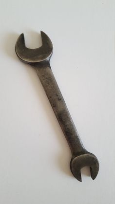 an old wrench on a white background