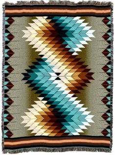 a multicolored blanket with fringes on it