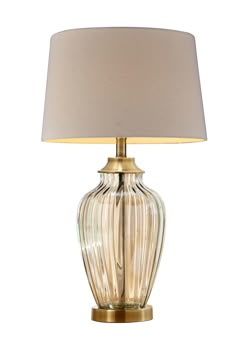 With an off-white lamp shade and a soft burnt orange finish on the base, this contemporary golden gaze Urn glass table lamp is attractive and elegant. In a lovely hue of soft champagne when not lit, this urn table lamp is constructed in glass material. The robust and bold profile of the lamp will look great on an end or side table. Display alone or in pairs for an eye-catching stylish arrangement. Topped with an off-white linen lamp shade to complete the look. ORE International Golden Gaze 28.5- Metal Bedside Table, Table Lamp Luxury, Bedside Table Metal, Architect Lamp, Bedside Table Lamp, White Lamp Shade, Table Lamp Base, Cream Fabric, Bronze Metal