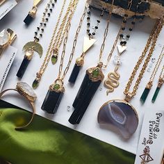 a bunch of necklaces that are on a table Travel Gift Bag, Higher Perspective, Jewels Diy, Golden Snake, Black Tourmaline Necklace, Brass Detail, Talisman Jewelry, Talisman Necklace, Snake Jewelry