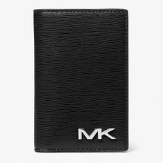 Michael Kors Cooper Bi-Fold Card Case, Black, Wallet, Card Holder Minimalism Counts In Our Cooper Card Case. Made From A Premium, Grain-Textured Material With Our Subtle Logo Hardware, This Front-Flap Accessory Includes Multiple Slots To Store Just The Essentials. Slender In Size, This Is A Grab-And-Go Favorite That Will Fit Into Your Pocket Or Briefcase With Ease. Card Case Textured Polyurethane Blend 60% Polyurethane/20% Cotton/20% Polyester 3”W X 4.48”H X 1”D Exterior Details: Back Slip Pocke Elegant Rectangular Logo Card Holder, Black Leather Card Holder With Logo, Classic Black Card Holder With Logo, Formal Rectangular Wallet With Logo, Black Business Wallet With Logo, Black Rectangular Wallet With Logo, Black Rectangular Wallets With Logo, Designer Silver Wallet With Card Slots, Michael Kors Luxury Bifold Wallet