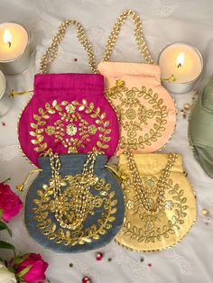 This beautiful handmade potli bag is perfect for haldi kumkum gift, jewelry organizer, wedding, gift bags, return favors, housewarming gifts, babyshower, Navratri, Diwali, Ganesha / Ganpati festival, Durga pooja, Karwa Chauth, Sanktanti, Lohri, Ugadi Eid, Ramadan, Christmas, Hannukah etc. The potli is big enough to keep your accessories and all needed essentials. Each piece is delicately handcrafted by skilled Indian artisans and your purchase supports small scale artisans. Shipped from GA, USA Gold Festive Pouch For Festivals, Festive Gold Pouch For Festivals, Gold Potli Bag For Festivals, Gold Potli Bag For Festive Occasions, Bollywood Style Multicolor Potli Bag For Wedding, Bollywood Style Handmade Potli Bag For Celebration, Multicolor Potli Bag For Wedding And Navratri, Handmade Potli Bag For Festivals And Celebrations, Handmade Gold Potli Bag For Celebration