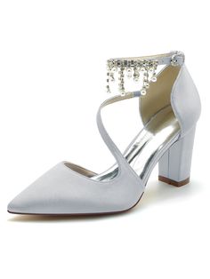 a women's white high heeled shoe with ankle strap and jewel embellishment