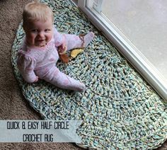 a baby is laying on the floor next to a window and rug with words that read, quick & easy half circle crochet rug