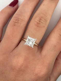 ✦ The Ring Shown in the Picture Holds a Beautiful 3.30 CT Pear Cut CVD Lab Grown Diamond. ✦ Main Stone Details✧ Type: CVD Lab Grown Diamond✧ Shape: Princess Cut✧ Weight: 1.30 CT I 2.30 CT I 3.30 CT ✦ All the CVD Lab Grown Stones are IGI Certified and Certificate will be provided with the order.✦ Ring Details✧ Metal: Gold (10KT, 14KT, 18KT)✧ Metal Tone: Yellow, White, Rose ✦ We promise unparalleled diamond and ring quality—always the best, never compromised Square Diamond Engagement Rings Gold, Square Diamond Engagement Ring, Princess Cut Engagement Ring, Engagement Rings Sale, Princess Cut Gold, Gold Diamond Engagement Rings, Traditional Diamond, Wedding Rings Solitaire, Cvd Diamond