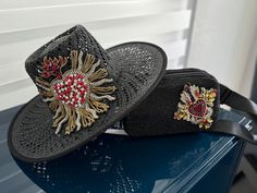 Sparkle in style with this one-of-a-kind bejeweled hat! Handmade just for you, it features a unique rhinestone beaded heart appliqué  that adds a touch of glam to any outfit. Perfect for making a statement wherever you go!  *matching Fanny pack in separate listing* https://goldiluxeexclusives.etsy.com/listing/1764365656