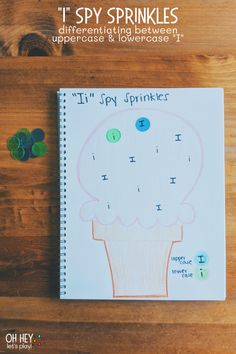 a spiral notebook with the words it's spy sprinkles on it