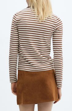 Etched buttons and crisp stripes bring regimental polish to this top cut from a fine, soft knit that's a welcome addition to any look. Button half placket Spread collar Long sleeves 80% polyester, 18% viscose, 2% elastane Machine wash, line dry Imported Chic Striped Hem Top For Fall, Classic Brown Tops With Striped Collar, Striped Hem Tops For Workwear In Fall, Striped Tops For Layering In Fall, Striped Hem Tops For Fall Workwear, Fall Workwear Tops With Striped Hem, Fall Crew Neck Top With Striped Collar, Fitted Vertical Stripes Top For Fall, Fitted Long Sleeve Tops With Horizontal Stripes