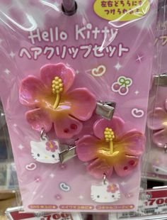 hello kitty hair clips are on display in a store