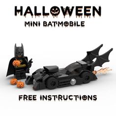 a lego batman car with bats and pumpkins