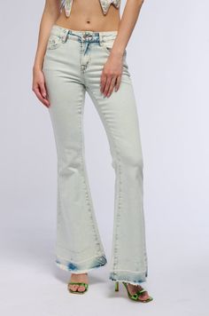 Effortlessly slip from day to night in The AKIRA Label Night Shift Flare Denim Pant. These sexy mid-rise jeans feature a curve-hugging fit n’ flare silhouette, a light wash base with dyed, marbled detailing around the pockets and waistband, and gently frayed and dip-dyed flared hems. They’re complete with functional belt loops, a zip-button front closure, and a classic five-pocket design. Dress them down with sneakers and a tee or gussy them up with stiletto boots and a silk blouse.  - 96% Cotton, 3% Polyester, 1% Spandex - Slight Stretch - Imported (all measurements approximate from a size 3)  - 40” Waist to Hem - 31.5” Inseam - 9” Rise - Model is 5'9" Product ID: 397770 (all measurements approximate from a size 17) - 42” Waist to Hem - 32” Inseam - 11” Rise Product ID: 397777 (all measur Dip Dyed, Stiletto Boots, Night Shift, Design Dress, Dip Dye, Denim Flares, Mid Rise Jeans, Denim Pant, Night In