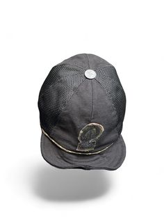 The Makshy black canvas baseball hat effortlessly blends classic style with individualistic flair. Its form-fitting design and comfortable fabric ensure a polished look, while the customisable letter motif and antique-style metal squatchee add a touch of vintage charm. This fashion-forward cap offers versatility with its adjustable and rollable visor, perfect for adapting to different styling preferences. Crafted for convenience, its foldable design makes it ideal for on-the-go wear and easy packing during travels. Metal eyelets enhance breathability, ensuring comfort in any weather. FEATURES * Black cotton canvas cap with nylon mesh  * Foldable eight-panel unisex design * Adjustable and rollable visor with built-in wire * Customisable camouflage fabric contoured black velcro letter emblem Black Breathable Flat Cap, Black Breathable Short Brim Hat, Black Fitted Baseball Cap With Short Brim, Fitted Black Baseball Cap For Outdoor, Black Breathable Six-panel Hat, Black Mesh Hat For Outdoors, Black Mesh Hat For Outdoor, Black Fitted Hat With Short Brim For Outdoor, Black Six-panel Fitted Hat