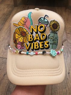 No Bad Vibes Trucker Hat with bead band to make this an even more one of a kind Hat! Adjustable Baseball Cap Trucker Hat For Festivals, Trendy Handmade Trucker Hat For Festivals, Handmade Trendy Trucker Hat For Festivals, Trendy Adjustable Beaded Hats, Fun Adjustable Trucker Hat For Festivals, Adjustable Fun Trucker Hat For Festival, Bohemian Snapback Trucker Hat For Summer, Bohemian Trucker Hat For Summer Festivals, Bohemian Summer Trucker Hat For Festival