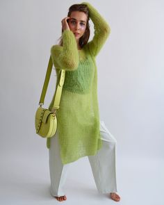 Hello, I'm the one, who won't let you down - lime green mohair tunic. I will comfort you, keep you warm and will make you smile. I'm 100% hand made and proud of that. I consist of 70% italian kid mohair and 30% of nylon, which makes me incredibly natural. I'm quite unique as could be worn all year long. I'm in one size and one size fits all because my measurements are : ❤️ Width -50 cm ❤️ Lengths -86 cm If you would like me in other size, you could request a custom order with your own parameters Oversized Green Sweater For Spring, Green Layering Sweater For Spring, Oversized Open Knit Green Sweater, Oversized Green Open Knit Sweater, Green Fine Knit Sweater For Spring, Spring Casual Mohair Sweater, Casual Mohair Sweater For Spring, Long Green Knit Sweater, Trendy Green Open Knit Sweater