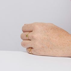 This gemstone stacking ring with peridot is made from solid 14k gold. This beautiful birthstone ring comes in yellow gold. This gold ring is made with real gold and real natural peridot. This peridot ring can be worn as a promise ring, engagement ring, stacking ring, or wedding ring. Add this gold ring to your collection now. 14k Yellow Gold Heart Ring With Gemstone, Everyday Yellow Gold Signet Ring With Gemstone, Yellow Gold Peridot Stackable Rings For Anniversary, Yellow Gold Rings With May Birthstone, Gold Sterling Silver Stackable Rings For May Birthstone, May Birthstone Open Ring In Yellow Gold, Yellow Gold Signet Ring With May Birthstone Gemstone, Yellow Gold Birthstone Ring With Recycled Gold, Yellow Gold Signet Ring With May Birthstone