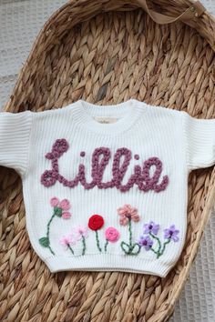 🤍 The perfect personalised sweater for your little love or a fantastic personalised gift  🤍 100% handmade designs with care and attention put into every sweater. Choose personalised wording or name with the optional addition of a floral meadow. 🤍 Colours may vary slightly due to screen settings and lighting. 🤍 Care Instructions - Turn the sweater inside out and Machine Wash or Hand Wash. Air Dry Naturally. Shipping  *Please note that there is a two-week lead time for personalised orders - if Personalized Pink Crew Neck Sweater, Customizable Cute Crew Neck Sweater, Cute Customizable Crew Neck Sweater, Personalized Cute Crew Neck Sweater, White Letter Print Sweater As Gift, White Cotton Sweater With Name Print, Personalized White Cotton Sweater, Handmade White Cotton Sweater, Baby Jumpers