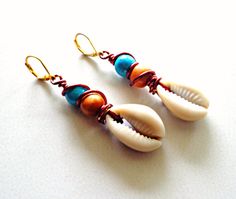 Wire Wrapped Cowrie Shell Dangle Earrings Boho Chic Earrings Bohemian Hand Wrapped Metal Earrings, Bohemian Wire Wrapped Jewelry For Vacation, Bohemian Shell Earrings For Jewelry Making, Metal Beaded Earrings For Beach, Handmade Metal Beaded Earrings For Beach, Beach Beaded Metal Earrings, Bohemian Shell Earrings Nickel Free, Bohemian Cowrie Shell Earrings As Gift, Bohemian Wire Wrapped Earrings For Beach