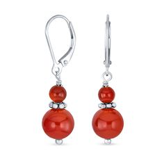 Add vibrant color effortlessly with our dyed red Coral earrings. Featuring an 8mm ball in stunning red, these sterling silver earrings have a polished finish and Lever back design for easy fastening. Perfect for adding a fun dash of red to your school or work look, or pairing with your favorite dress for sophisticated style. Get ready with our dyed red Coral earrings. Red Hypoallergenic Jewelry For Formal Occasions, Hypoallergenic Red Jewelry For Formal Occasions, Formal Red Hypoallergenic Jewelry, Red Round Earrings With Polished Finish, Nickel-free Red Carnelian Earrings, Carnelian Round Earrings With Ear Wire, Elegant Carnelian Earrings, Red Carnelian Earrings, Nickel-free Carnelian Jewelry