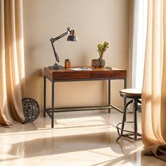 a desk with a lamp on it next to a window